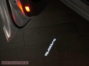Оригинальная LED подсветка передних и задних дверей Audi в форме надписи QUATTRO (4G0052133H)